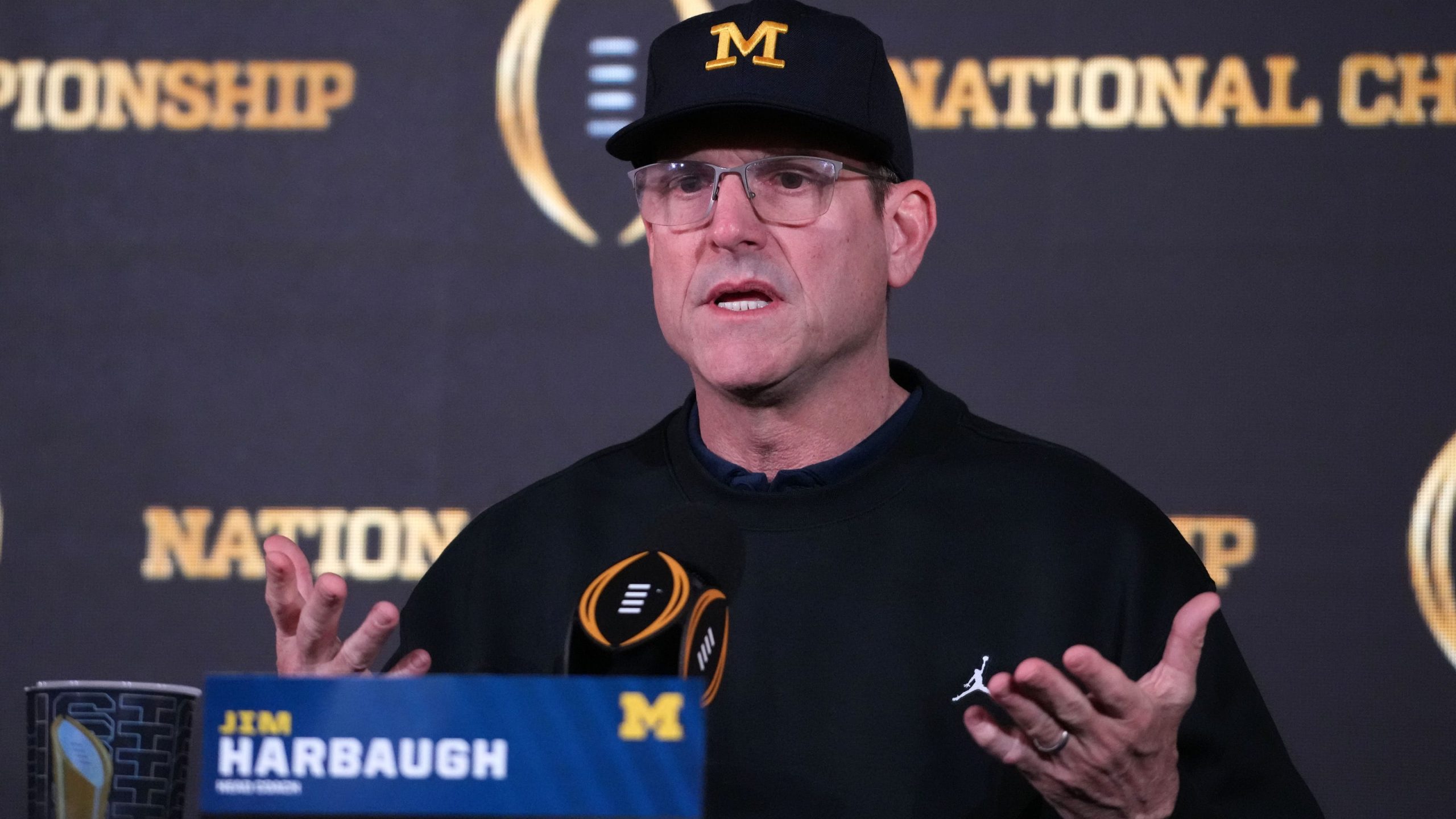 What is Jim Harbaugh’s punishment in Michigan sign-stealing scandal?